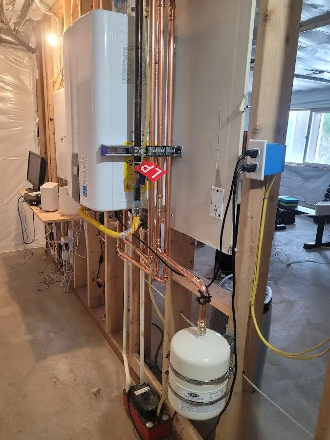 Licensed plumber repairing a kitchen sink in Lumberton